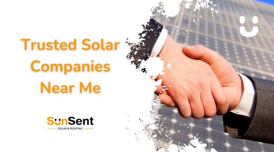 Business handshake in front of solar panels representing trusted solar companies near me by Sunsent Solar & Roofing.